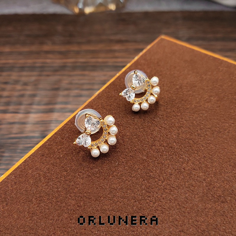 Lumière Bow Butterfly Pearl Clip-On Earrings — Edition 74 product image