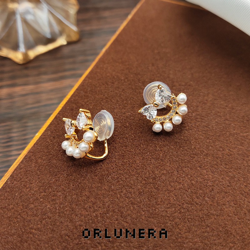 Lumière Bow Butterfly Pearl Clip-On Earrings — Edition 74 product image