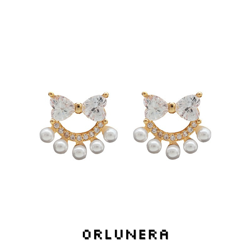 Lumière Bow Butterfly Pearl Clip-On Earrings — Edition 74 product image