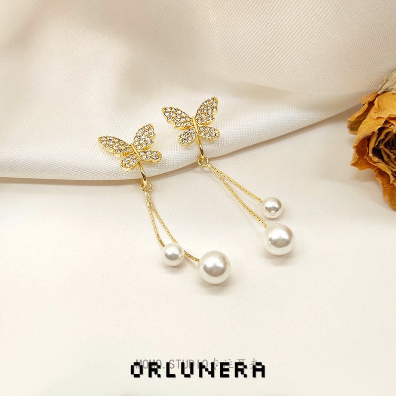 Celeste Butterfly Pearl Tassel Clip-On Drop Earrings product image