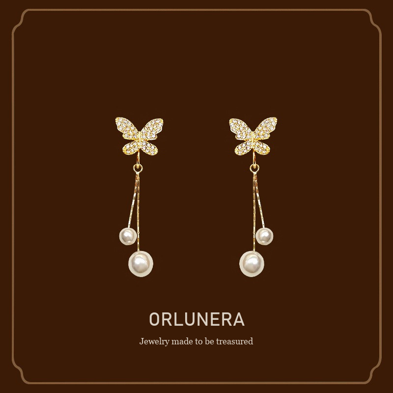 Celeste Butterfly Pearl Tassel Clip-On Drop Earrings Orlunera cover
