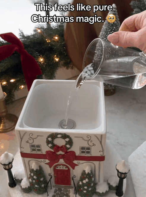 Christmas cottage diffuser showing daytime charm and nighttime glow