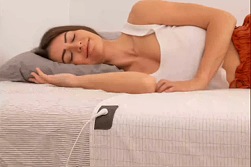 Woman resting comfortably in bed