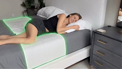 Woman sleeping on a grounding sheet