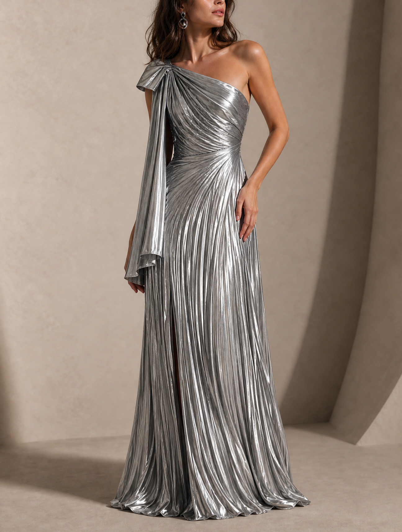 Metallic Silver Pleated One-Shoulder Gown with Bow Sash & High Thigh Slit