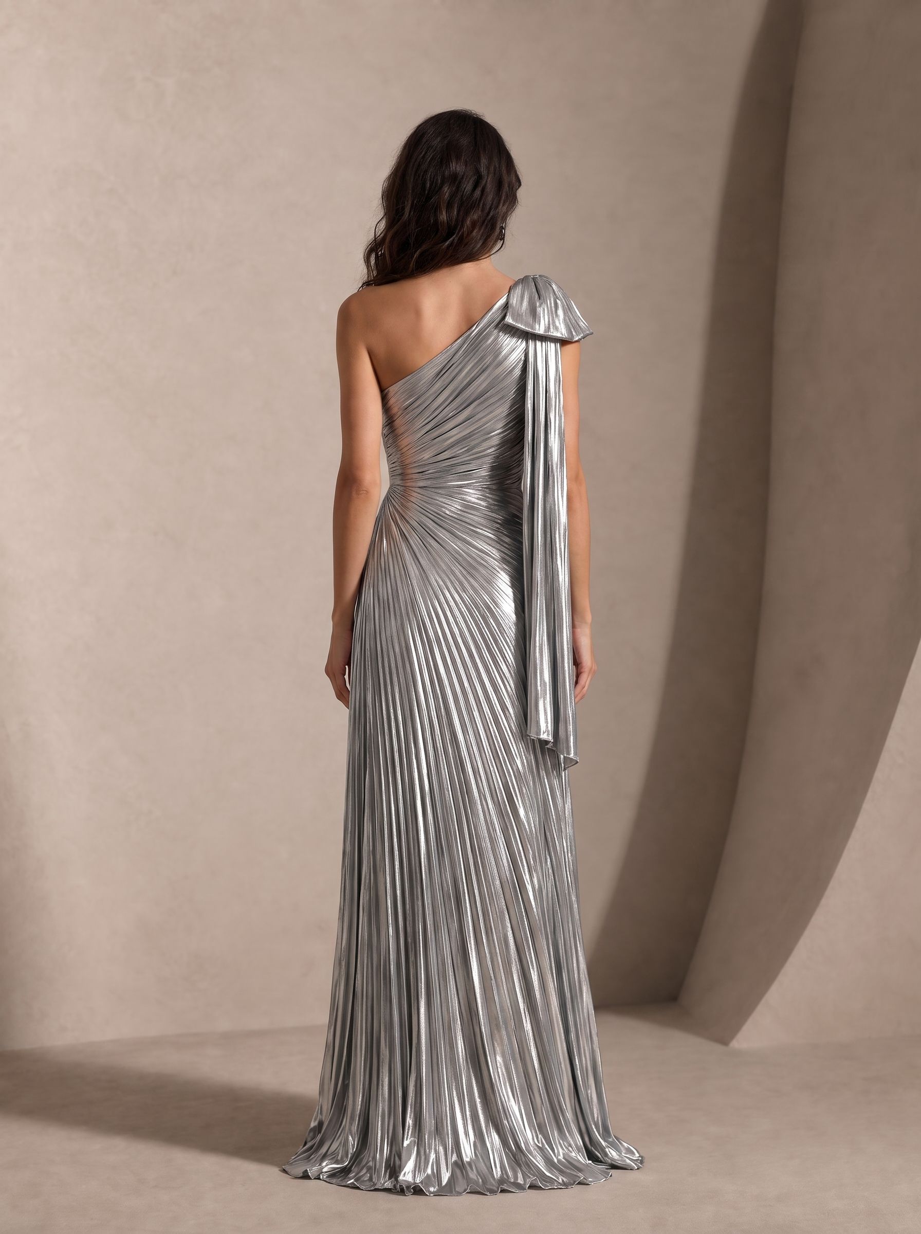 Metallic Silver Pleated One-Shoulder Gown with Bow Sash & High Thigh Slit