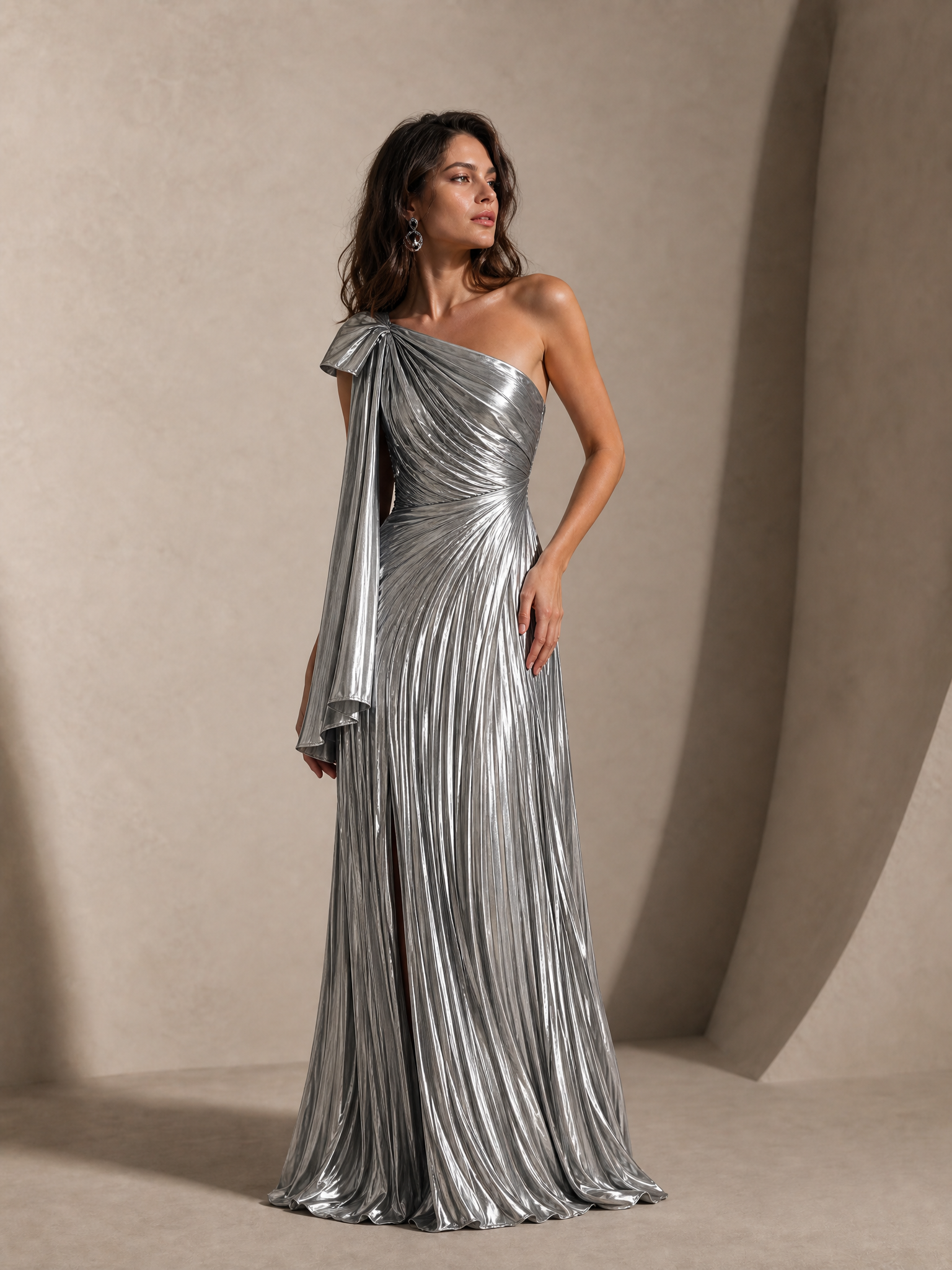 Metallic Silver Pleated One-Shoulder Gown with Bow Sash & High Thigh Slit