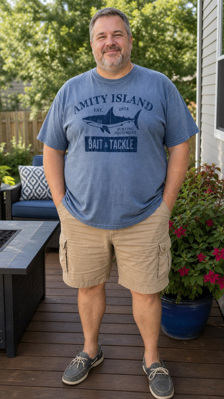 Customer wearing washed denim vintage shark graphic tee
