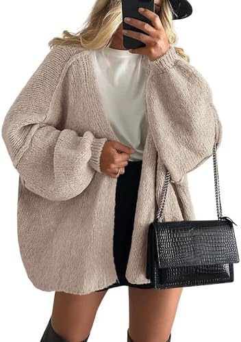 Grey beige cardigan styled with a white top and black bottoms