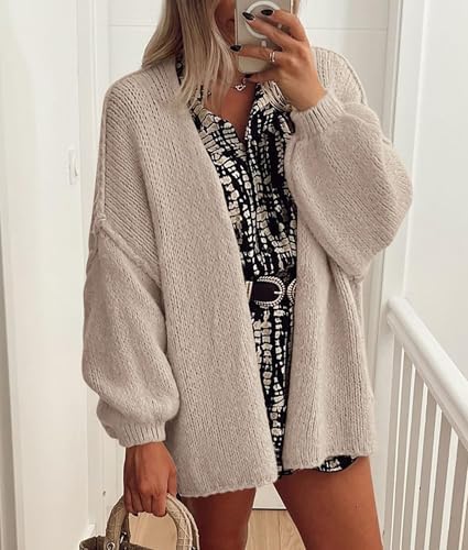 Grey beige cardigan layered over a patterned outfit