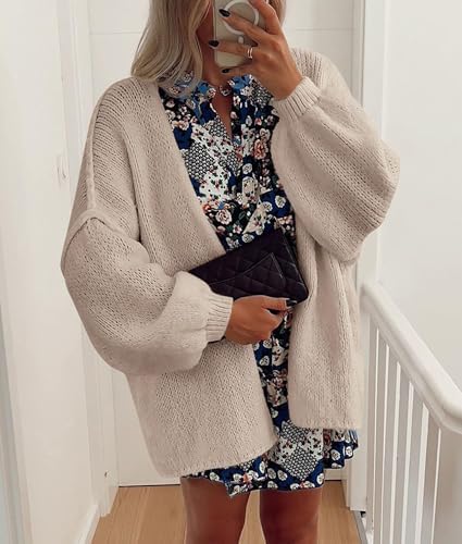 Grey beige cardigan layered over a floral outfit