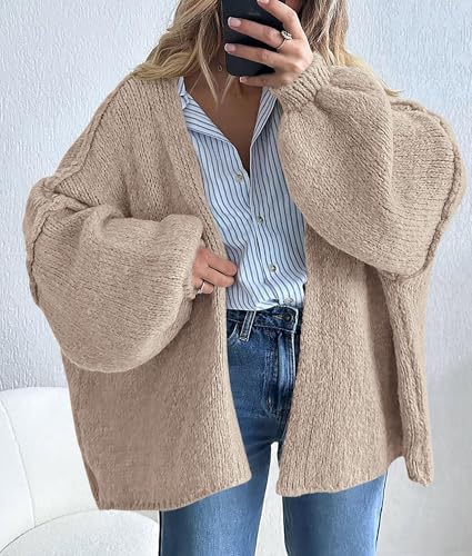 Grey beige cardigan styled with a striped shirt and jeans