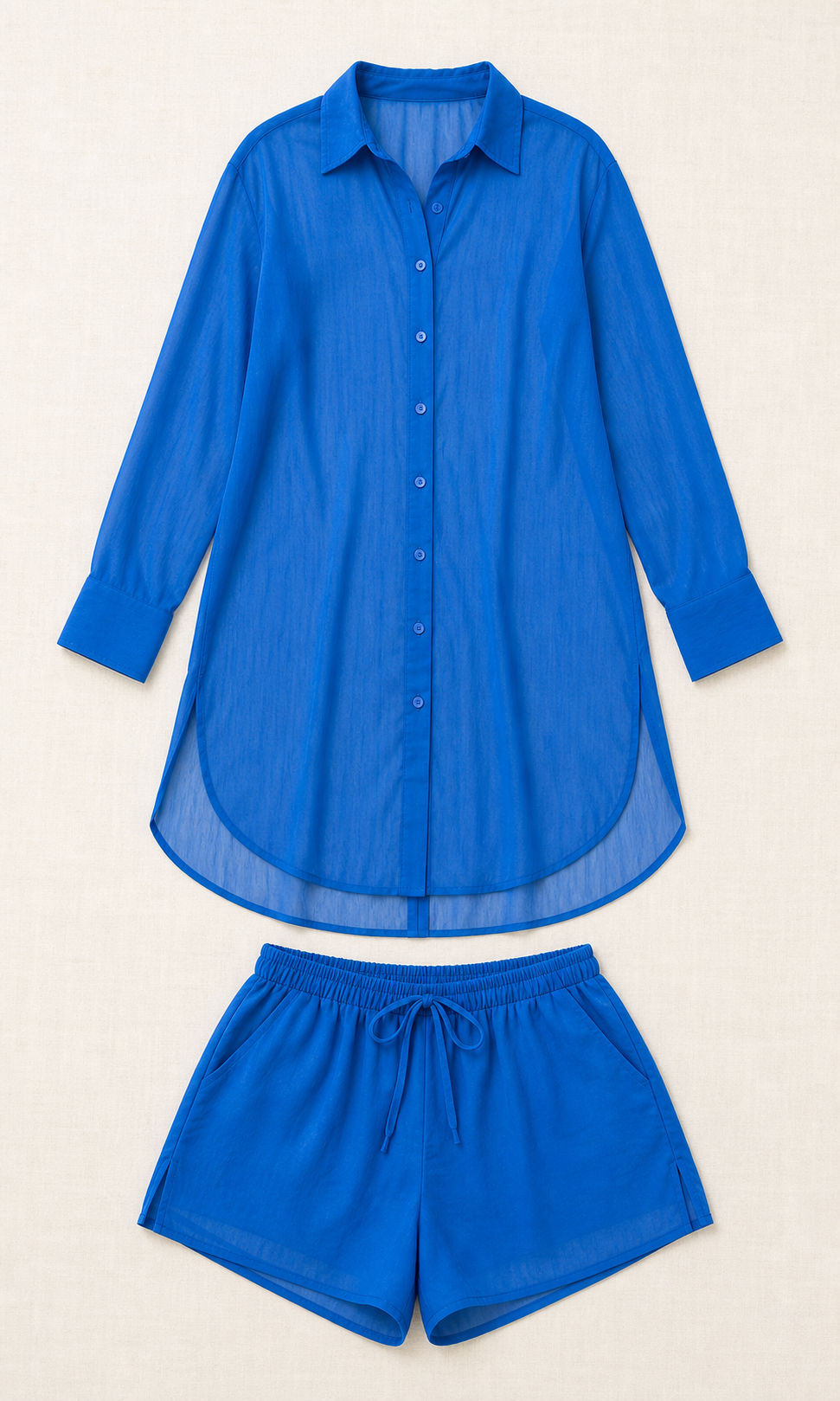 Blue complete shirt and shorts set shown flat