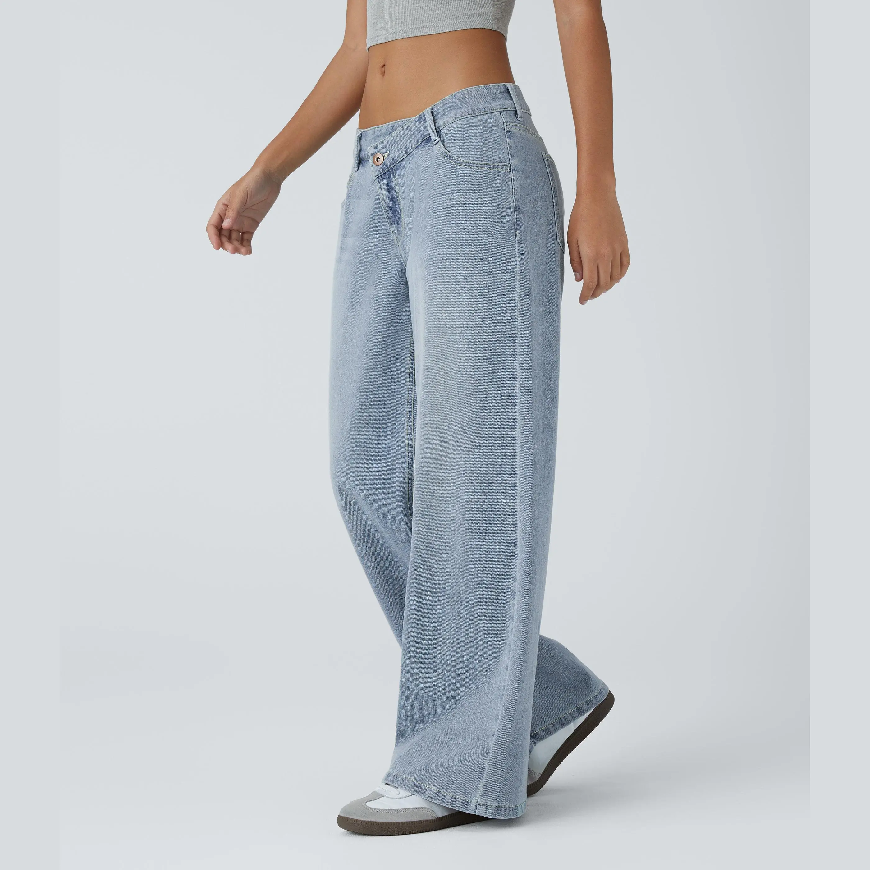 Asymmetric waistband and button zipper detail