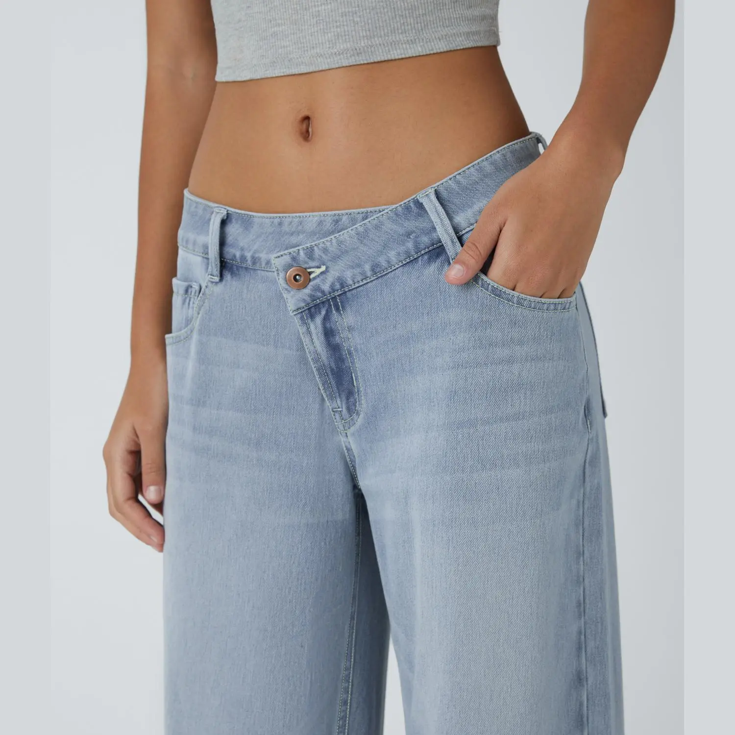 Low-rise asymmetric waistband close view