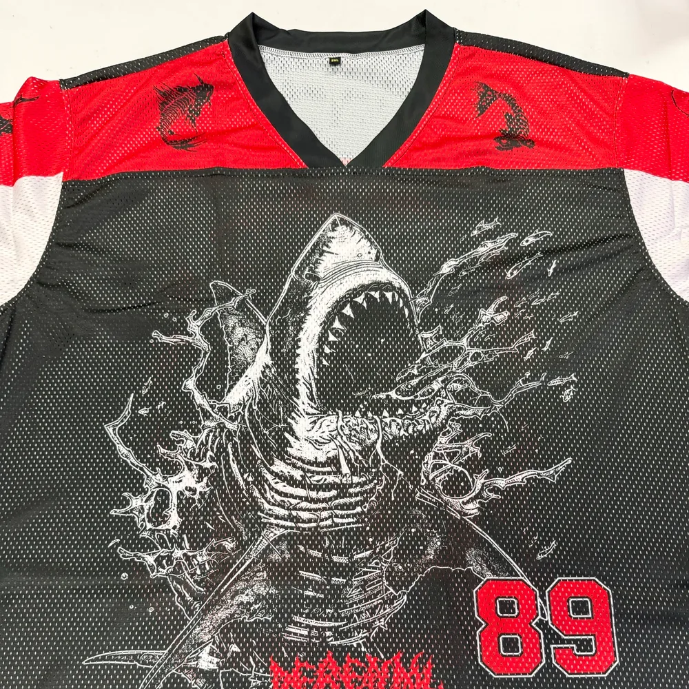 Real Mesh Jersey sample showing V-neck, shoulder panels, seams, and printed mesh