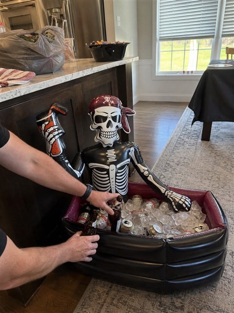 Pirate skeleton cooler being filled in a home kitchen