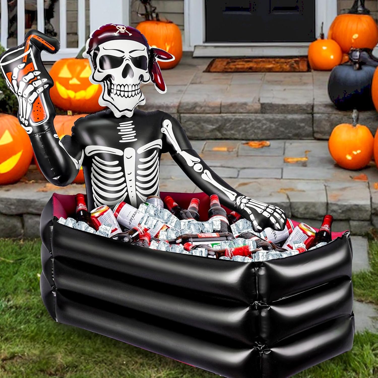 Inflatable pirate skeleton cooler filled with ice and drinks on a Halloween porch