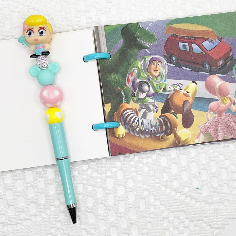 Toy Story inspired autograph pen, beaded ballpoint pen with Disney Doorable, Woody, Jessie, Rex, Bo Peep, Bunny, Ducky, Slinky