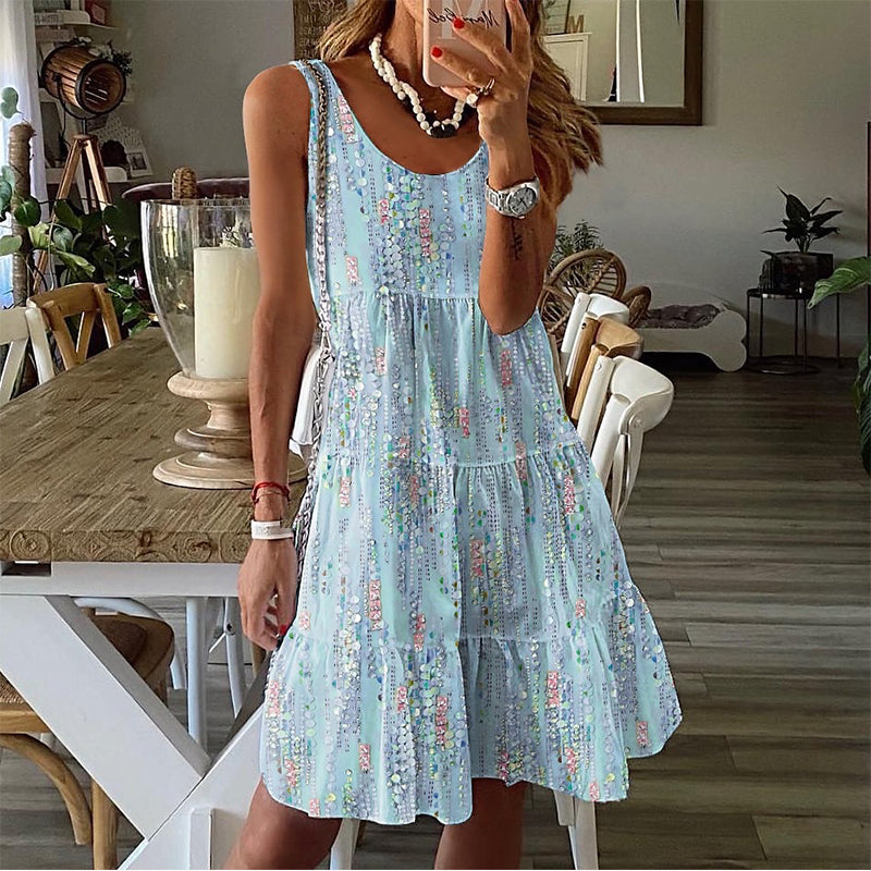 👗Damska sukienka midi bez rękawów, z okrągłym dekoltem i warstwowym fasonem.