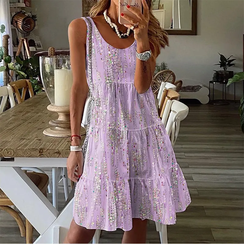 👗Damska sukienka midi bez rękawów, z okrągłym dekoltem i warstwowym fasonem.