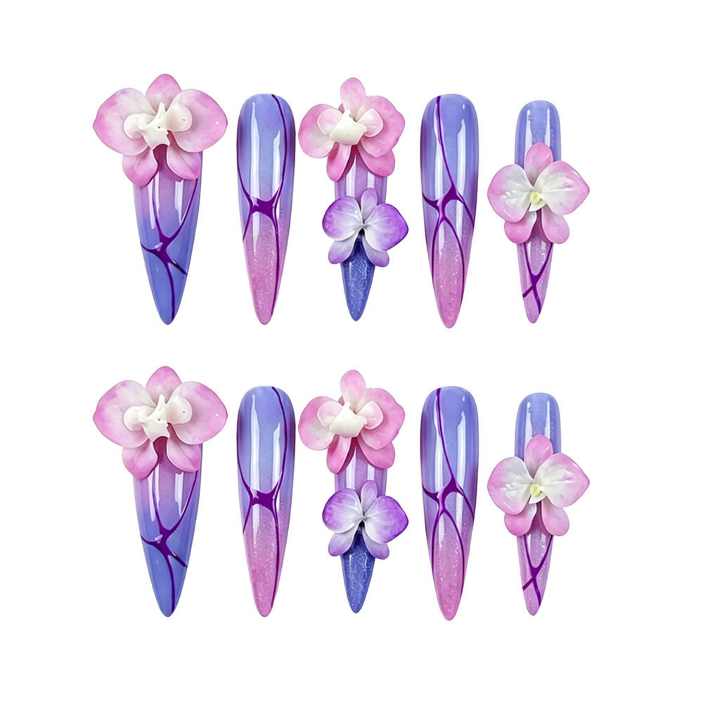 High-gloss iridescent press-on nails with 3D sculpted pink and purple orchids and fine purple line-work.
