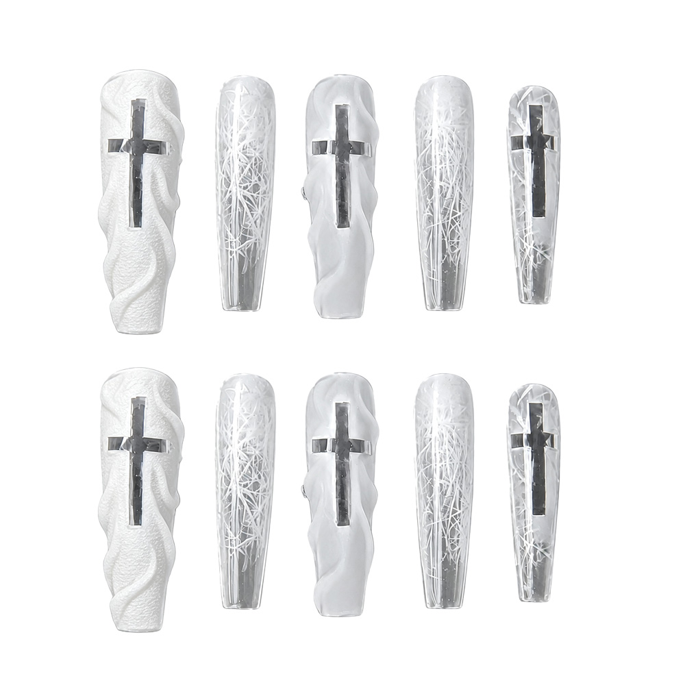 Glossy coffin press-on nails featuring a misty white gradient, hand-painted ice textures, and black cross emblems.