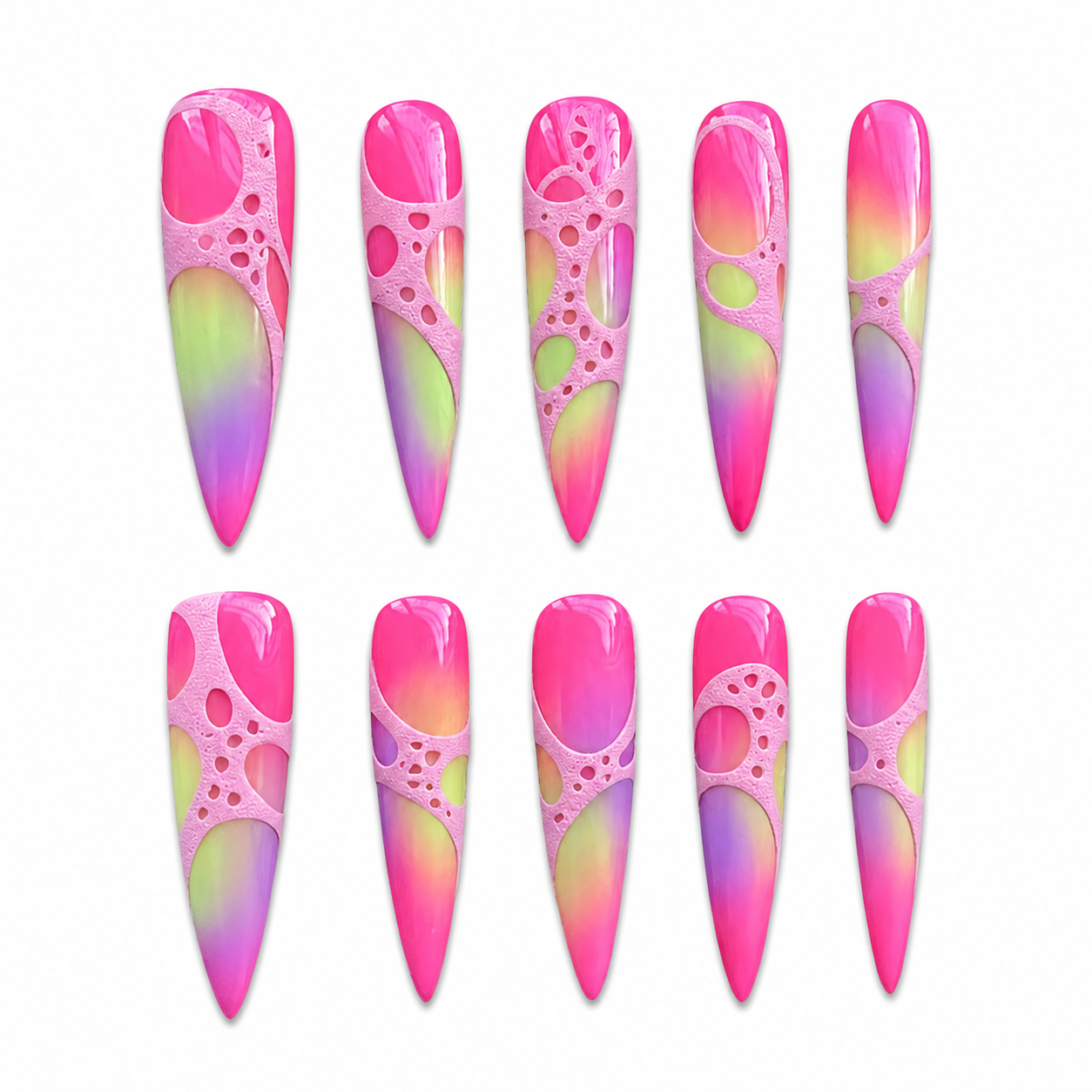 High-gloss press-on nails with neon pink, green, and purple gradients under a textured pastel pink 3D cellular overlay.