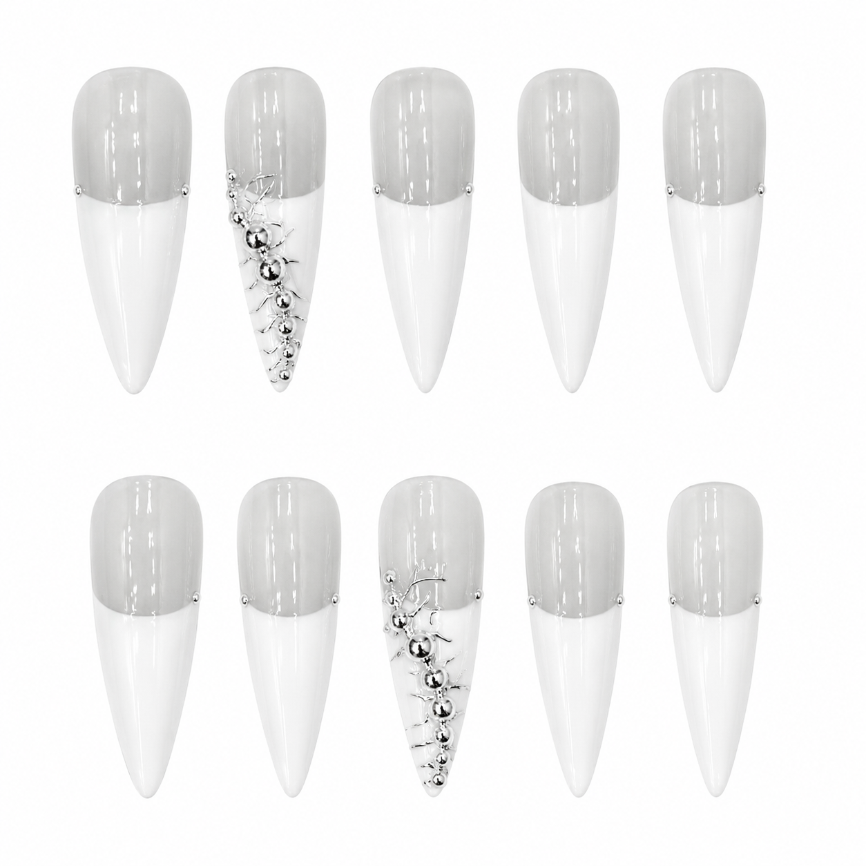 Glossy stiletto press-on nails featuring white deep French tips on grey bases, accented with a 3D silver metal bead spine.