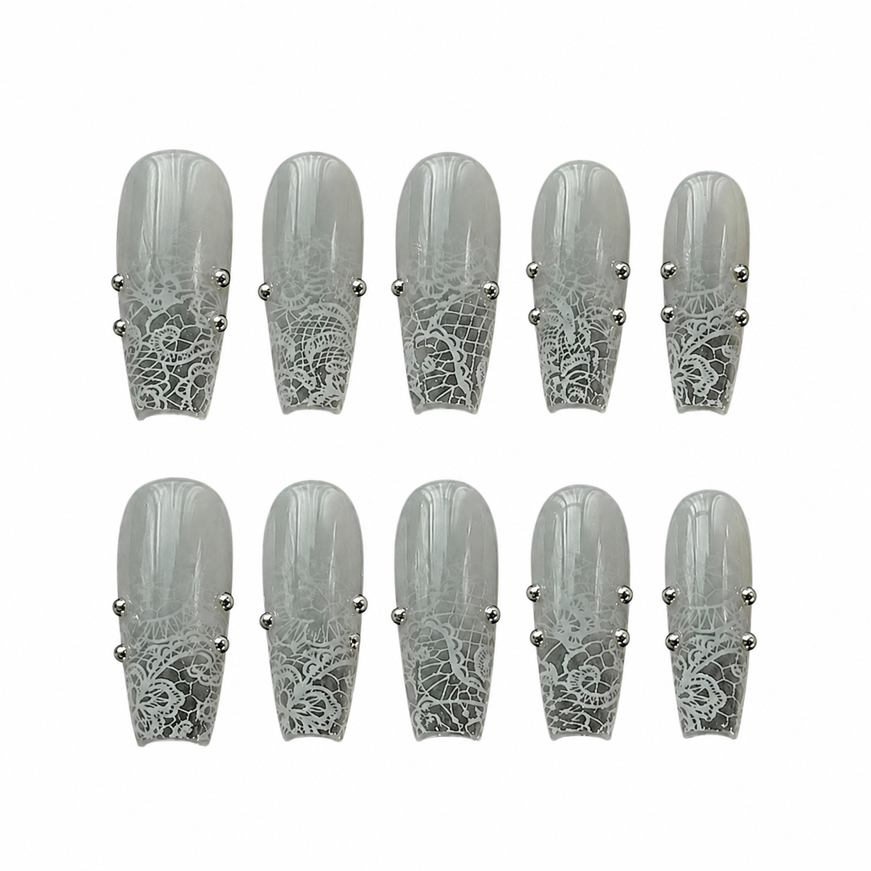 Glossy coffin press-on nails with a grey gradient base, hand-painted white lace patterns, and silver punk side studs.