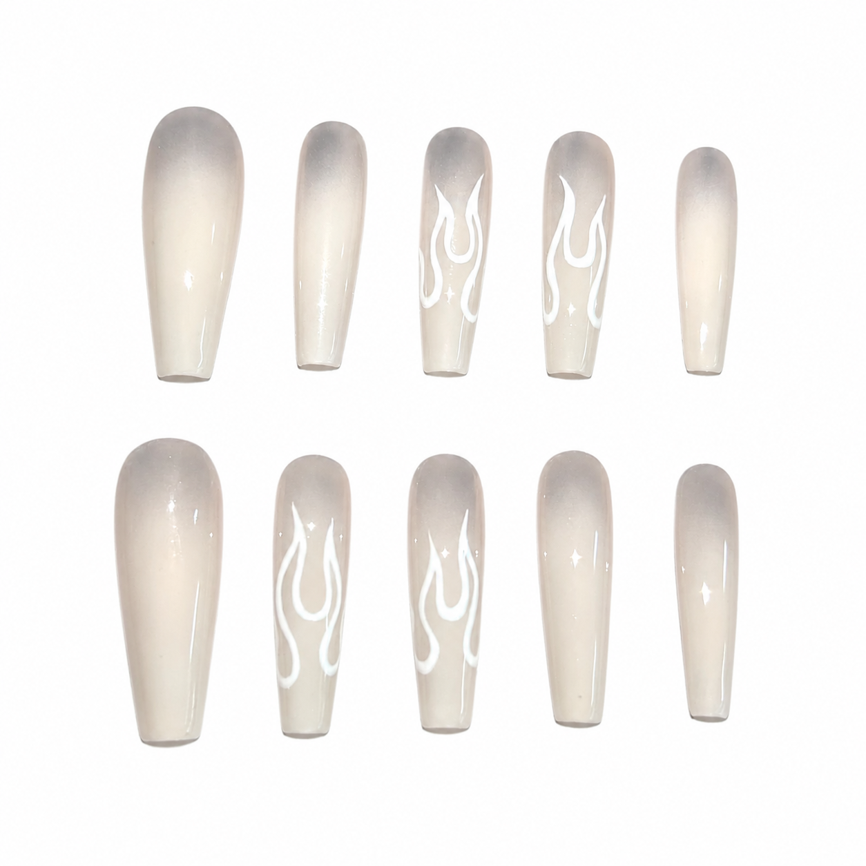 Glossy press-on nails with a milky white and translucent grey gradient, featuring hand-painted white flame outlines and subtle star glints.