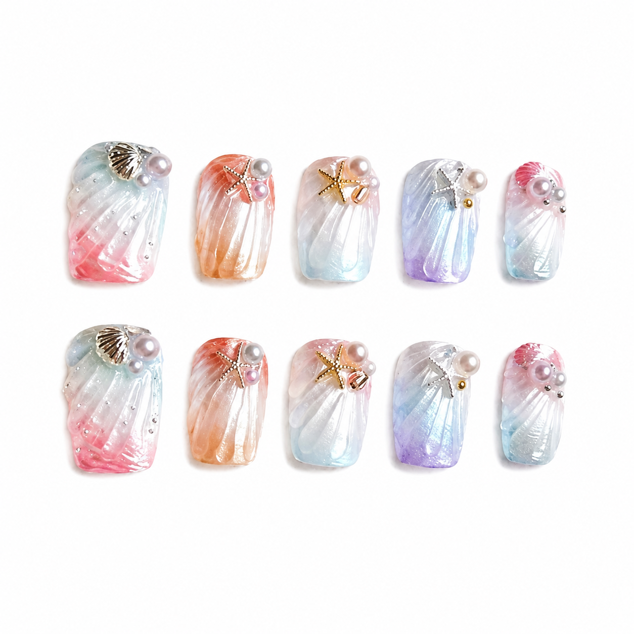 Glossy press-on nails with 3D sculpted shell textures, pastel pink and blue pearlescent gradients, and pearl starfish charms.