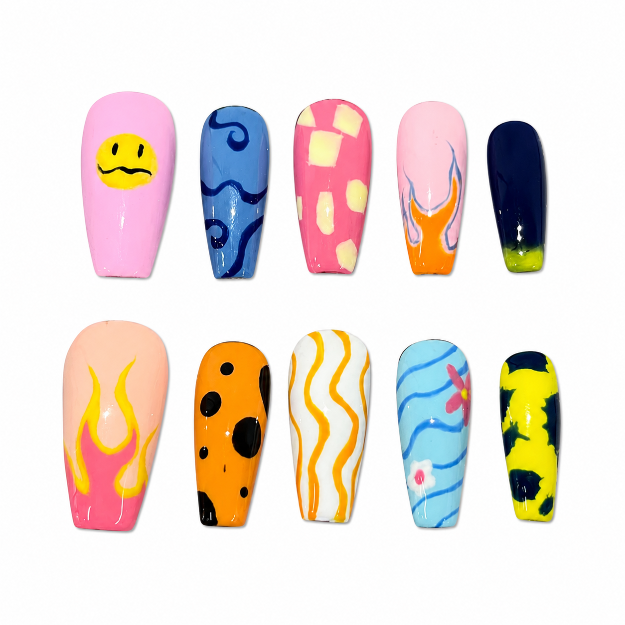 Glossy press-on nails with mismatched hand-painted Y2K designs including a melting smiley face, hot pink flames, and multi-colored abstract patterns.