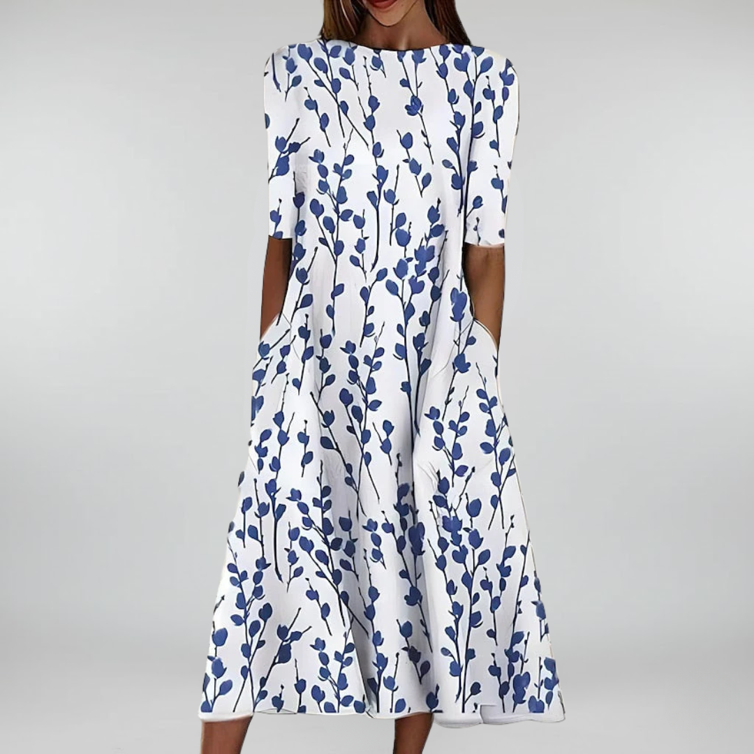 Sela™ – Robe midi estivale avec un élégant imprimé floral
