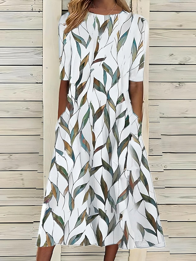 Sela™ – Robe midi estivale avec un élégant imprimé floral