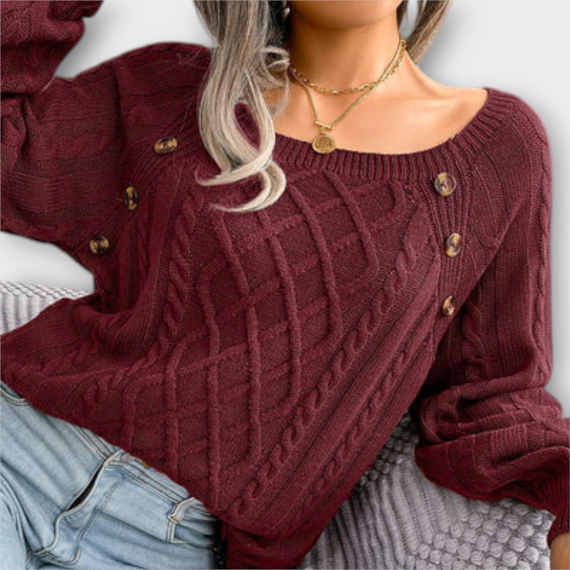 Pull élégant en maille torsadée – avec détails de boutons