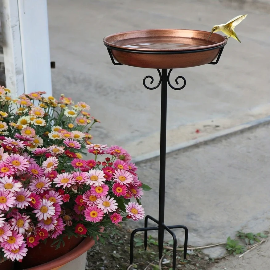 Copper-coated graduated bird bath bowl for garden birds