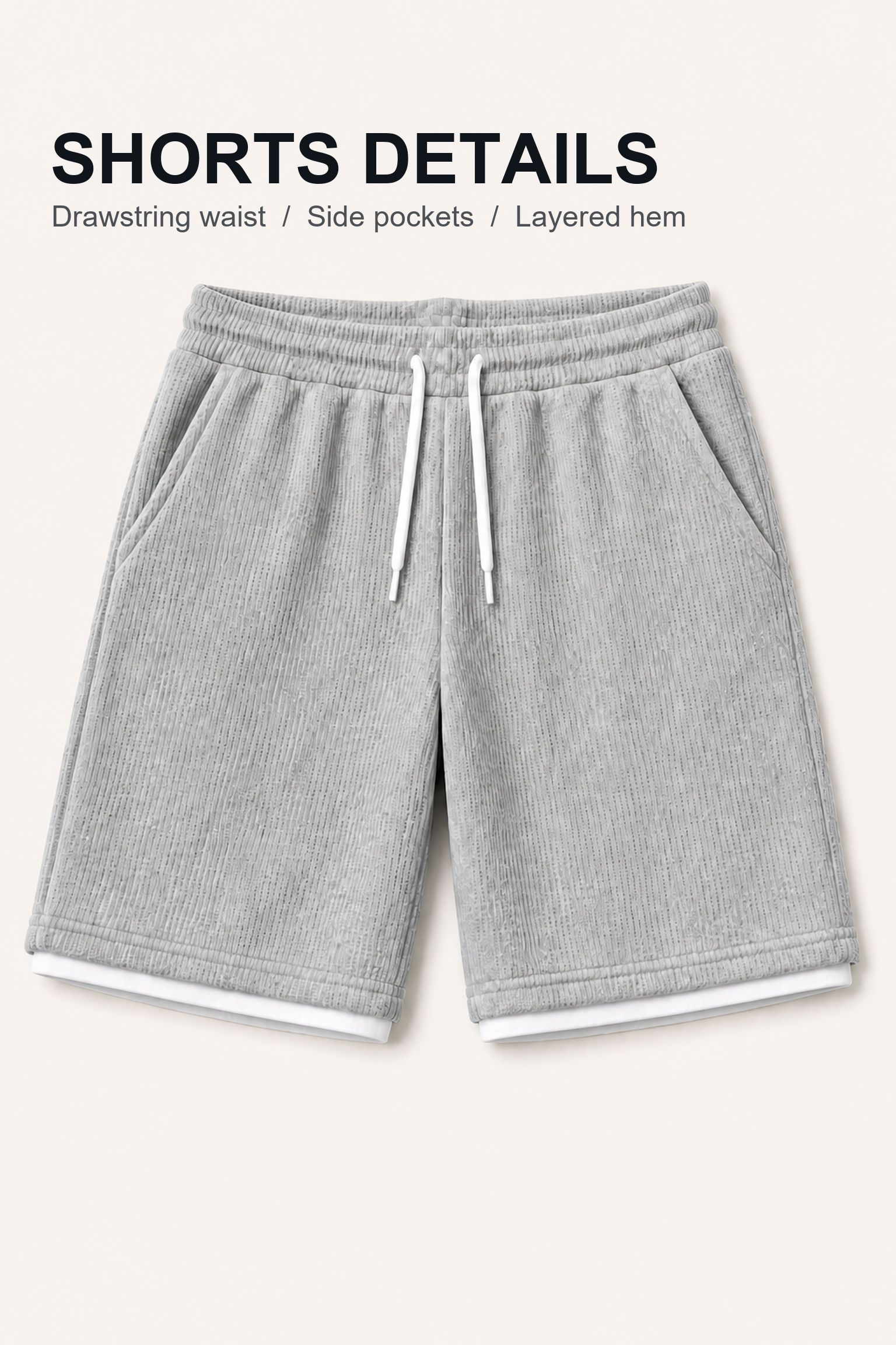 Light heather gray shorts showing drawstring waist, side pockets, and layered hem