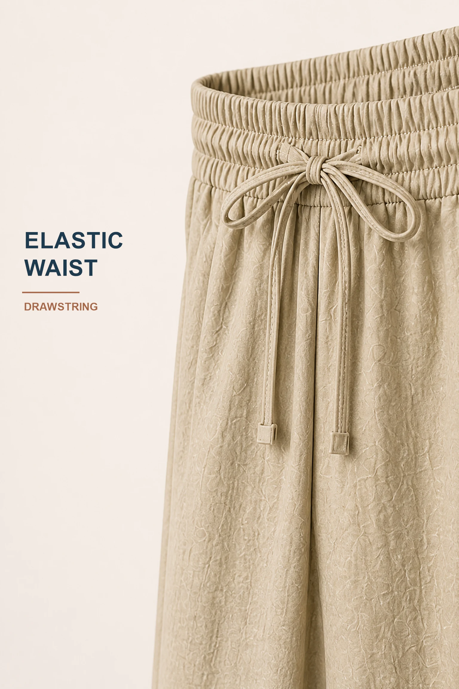 Close detail of gathered elastic waist and centered drawstring