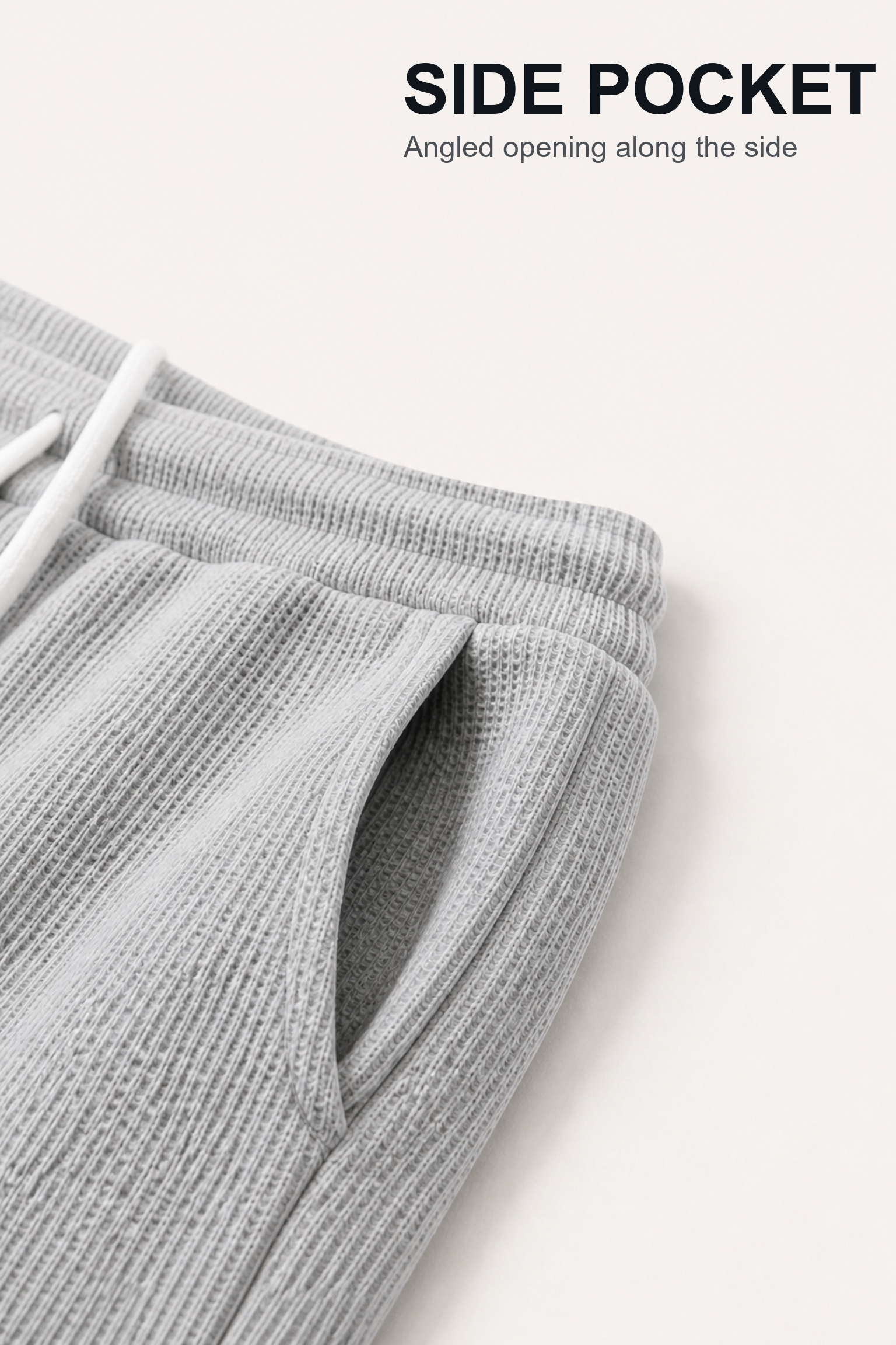 Close-up of angled side hand pocket opening