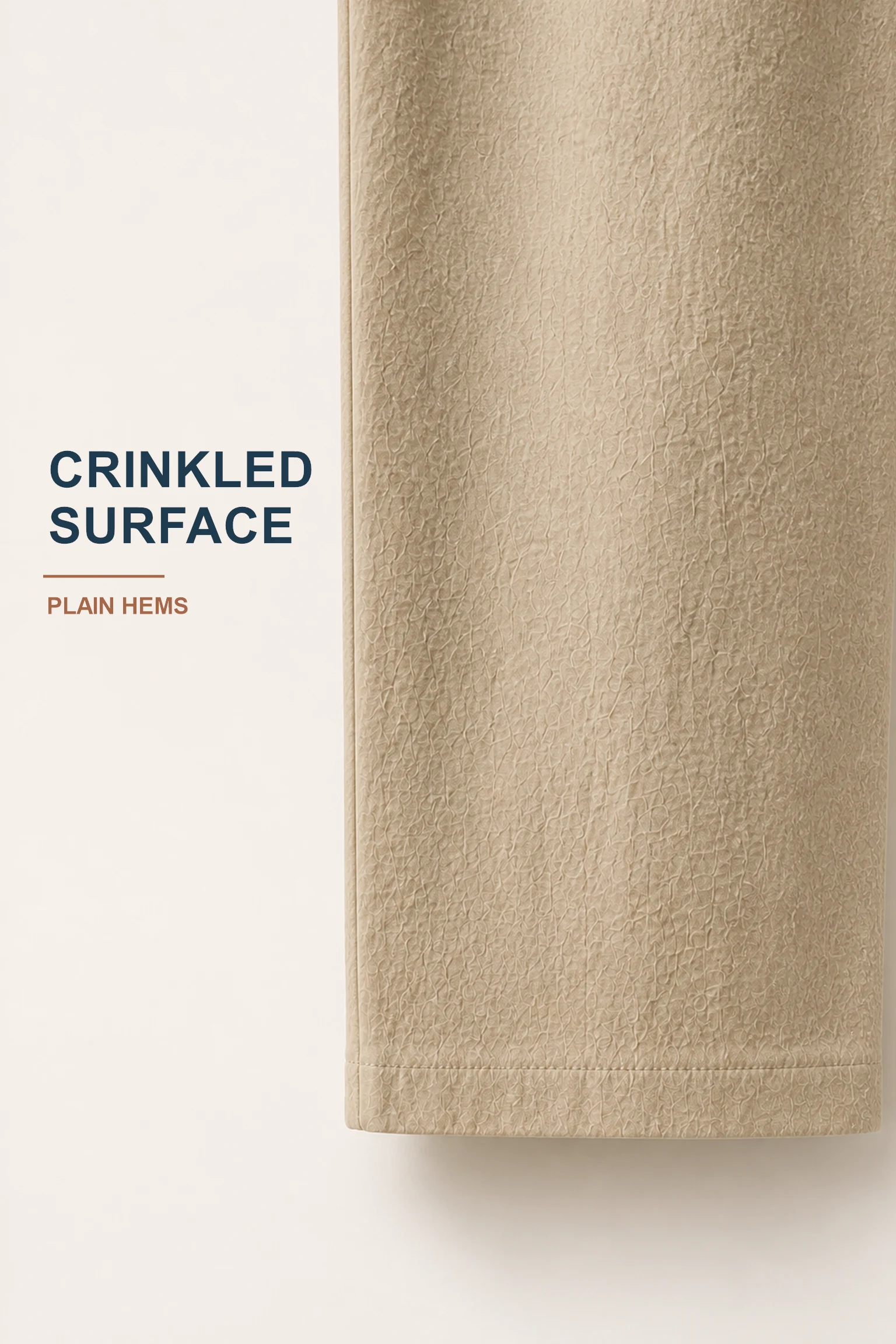 Close detail of crinkled surface and plain uncuffed hem