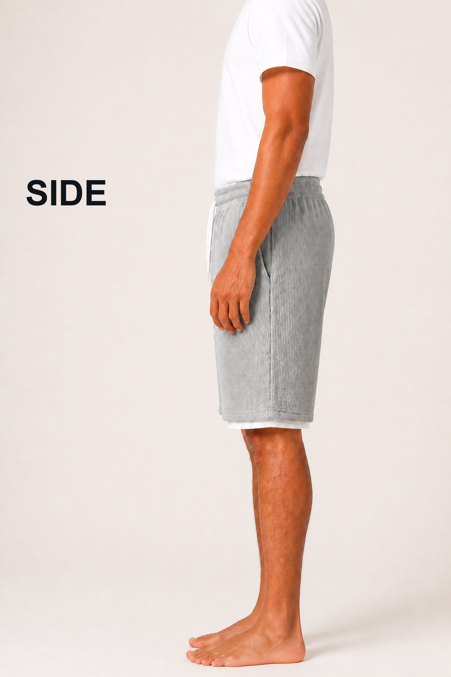 Balanced side view of men's knee-length drawstring shorts