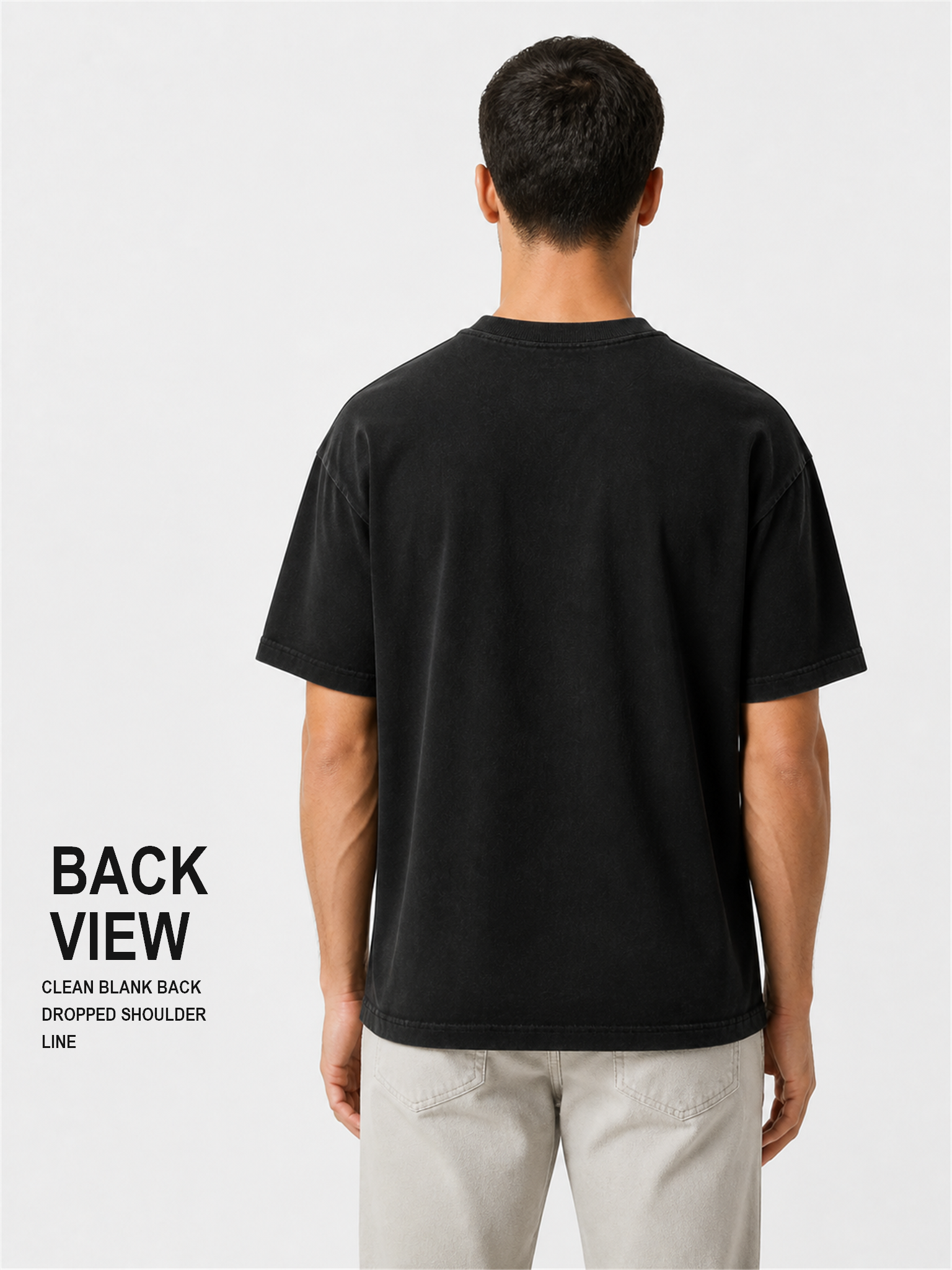 Male model back view showing a clean blank back and dropped shoulder line