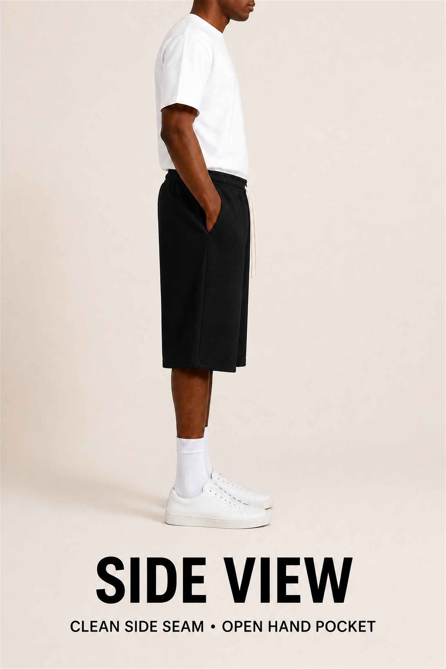 Black unisex knee-length shorts side view with open hand pocket