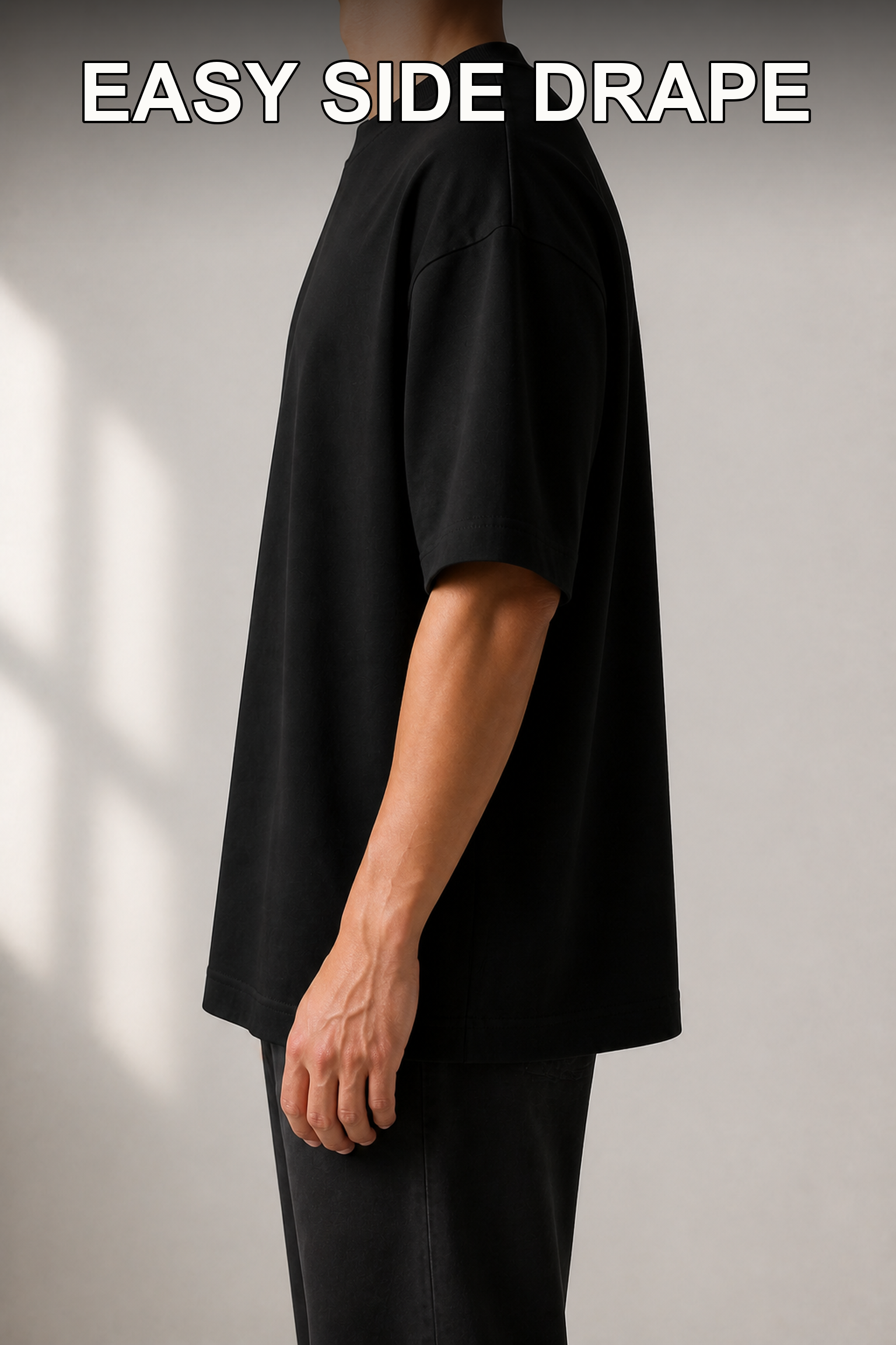 Complete side drape view of oversized T-shirt without model face