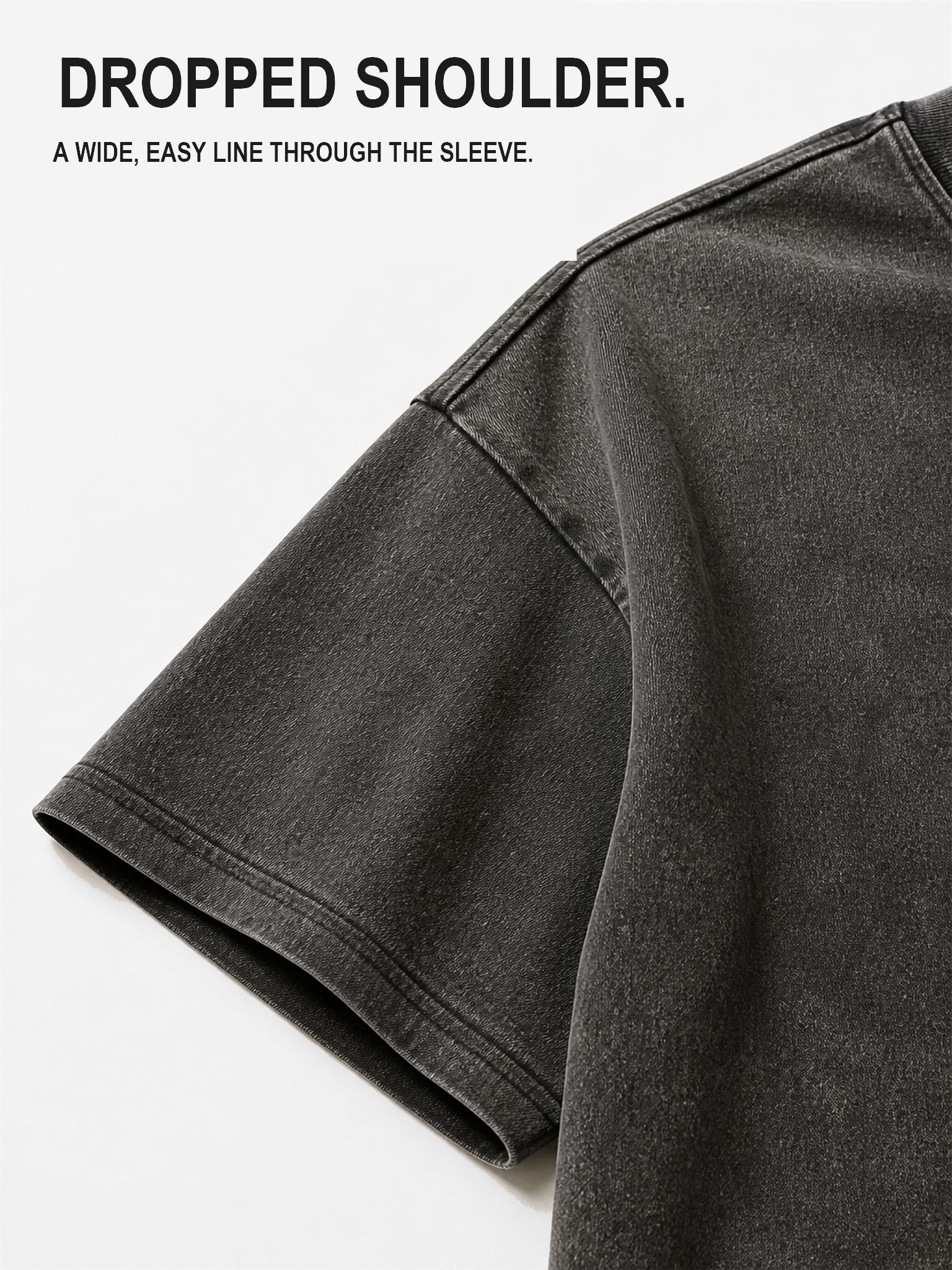 Large close-up of the dropped shoulder and short sleeve construction