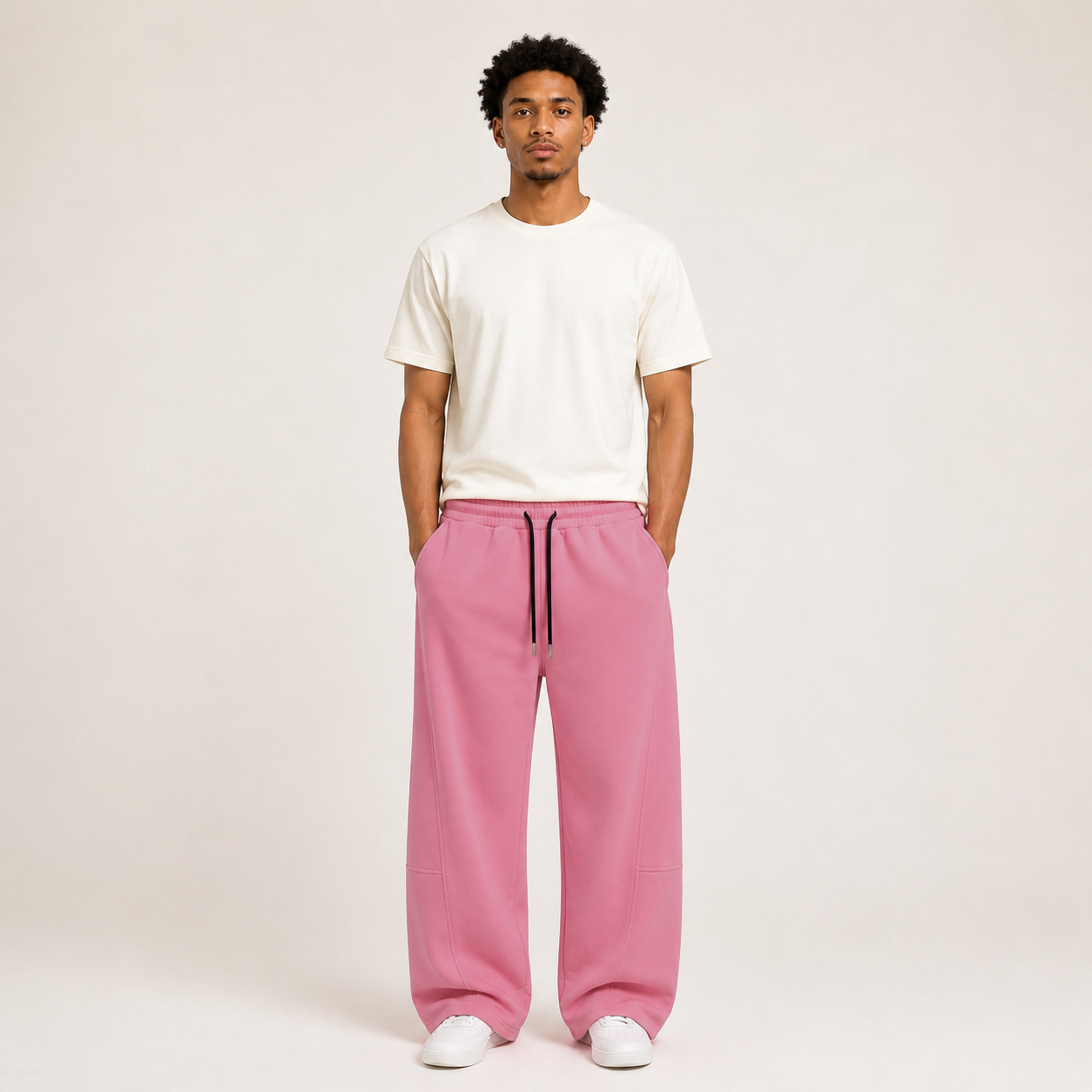 Front fit of pink drawstring wide-leg sweatpants