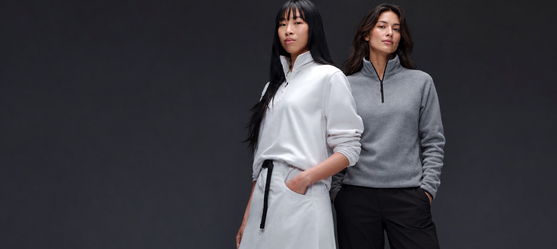Two women wearing soft fleece layers.
