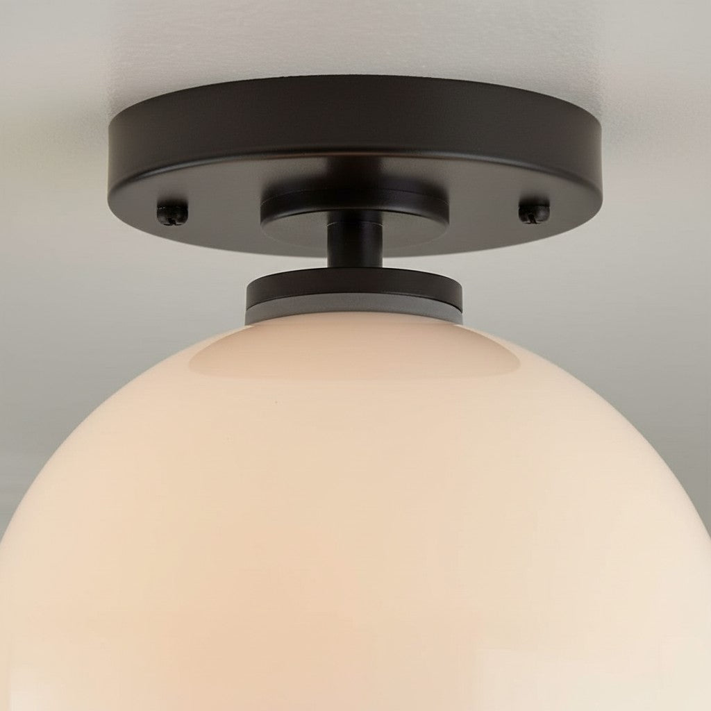 Clarke Moderne runde Deckenleuchte aus Glas detail1.webp__PID:b027ae18-b445-475b-9db2-1215f7942375