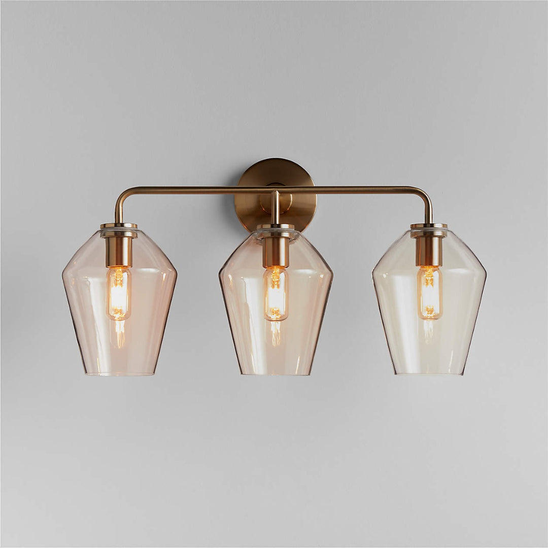 Elara Moderne geometrische Wandleuchte aus Glas und Metall, klares Messing.webp__PID:228eedf6-ce8f-4090-b404-22cb027e45c1